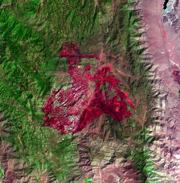 The 2000 Manter fire in Tulare County, California. Landsat bands 7, 4, and 3 are used to highlight the burn scar in red. Image Credit: Sierra Nevada Water Resources Team